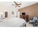 Spacious bedroom with ceiling fan and ample closet space at 8551 Gold Peak Dr # B, Highlands Ranch, CO 80130