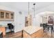 Eat-in kitchen with granite island and built-in desk area at 8551 Gold Peak Dr # B, Highlands Ranch, CO 80130