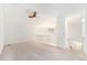 Spacious loft area with ceiling fan and carpet flooring at 8551 Gold Peak Dr # B, Highlands Ranch, CO 80130