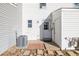 Image displays the home's backyard, which contains an A/C unit and other utilities at 3281 S Estes St, Lakewood, CO 80227