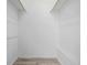 Empty closet with minimalist shelving in a neutral color at 3281 S Estes St, Lakewood, CO 80227