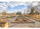 Neighborhood community garden area provides residents with a shared green space for planting and leisure at 3281 S Estes St, Lakewood, CO 80227