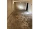 Unfinished basement space shows flooring and potential for customization at 7870 Magnolia St, Commerce City, CO 80022