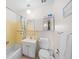 Bathroom with a vanity and tiled shower/tub at 12087 W New Mexico Ave, Lakewood, CO 80228