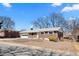 Charming brick home with a well-maintained yard; ideal for families and entertaining at 12087 W New Mexico Ave, Lakewood, CO 80228