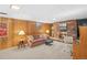 Bright living room with a brick fireplace and comfortable seating at 12087 W New Mexico Ave, Lakewood, CO 80228