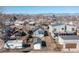 Aerial view of the home highlighting its location in a residential neighborhood and backyard at 4166 N Yates St, Denver, CO 80212
