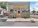 Exterior view of a commercial building with vintage signage and outdoor seating area at 4166 N Yates St, Denver, CO 80212
