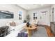Cozy living room with ample natural light, comfortable seating, and stylish decor at 4166 N Yates St, Denver, CO 80212