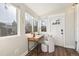 Sunroom office features a desk, chair, and large windows letting in plenty of natural light at 4166 N Yates St, Denver, CO 80212