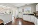 Cozy kitchen area with adjacent dining offers views to the backyard at 1047 Scranton St, Aurora, CO 80011