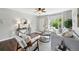 Bright living room showcases contemporary furniture, decorative lighting, and large windows, creating an airy atmosphere at 1047 Scranton St, Aurora, CO 80011