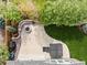 Aerial view of the backyard with a hot tub and fire pit at 6827 Leilani Ln, Castle Rock, CO 80108