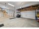 Spacious garage with ample storage space, and overhead racks at 6827 Leilani Ln, Castle Rock, CO 80108