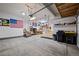 Well-organized garage with storage, workshop area, and American Flag at 6827 Leilani Ln, Castle Rock, CO 80108