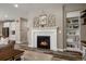 A well decorated living room showing fireplace, built-ins, and living area at 6827 Leilani Ln, Castle Rock, CO 80108