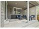 Covered patio area includes outdoor furniture and decor at 6827 Leilani Ln, Castle Rock, CO 80108