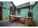 Inviting back deck features outdoor seating with a table, perfect for entertaining guests at 814 Rose St, Georgetown, CO 80444
