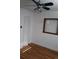 Bedroom featuring neutral walls, ceiling fan, and hardwood floors at 814 Rose St, Georgetown, CO 80444