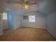 Bedroom featuring neutral walls, ceiling fan, and carpet at 814 Rose St, Georgetown, CO 80444