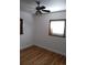 Bedroom featuring neutral walls, ceiling fan, and hardwood floors at 814 Rose St, Georgetown, CO 80444