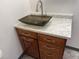 This bathroom features a sink with a cabinet, marble countertop, updated fixtures, and neutral paint at 992 S Dearborn Way # 7, Aurora, CO 80012