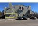 Inviting condo exterior features a charming patio and convenient parking at 992 S Dearborn Way # 7, Aurora, CO 80012