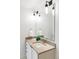 Well-lit bathroom with modern vanity, light fixtures, and stylish decor at 1750 Wewatta St # 740, Denver, CO 80202