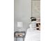 Cozy bedroom with stylish accents, including a modern lamp and artistic wall decor at 1750 Wewatta St # 740, Denver, CO 80202