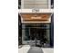 Exterior entrance to the building featuring modern architecture and clear signage at 1750 Wewatta St # 740, Denver, CO 80202