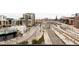 Wonderful aerial view of a city with hotels, railroad tracks, and roads at 1750 Wewatta St # 740, Denver, CO 80202