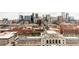 Scenic aerial view showcasing the city skyline with a mix of modern skyscrapers and historic buildings at 1750 Wewatta St # 740, Denver, CO 80202