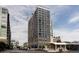 Modern high-rise building exterior with a sleek design and many windows at 1750 Wewatta St # 740, Denver, CO 80202
