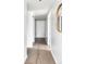 Bright hallway with wood flooring and modern architectural details at 1750 Wewatta St # 740, Denver, CO 80202
