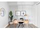 Bright office space with hardwood floors, a modern desk, and stylish decor at 1750 Wewatta St # 740, Denver, CO 80202