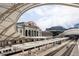 Expansive view of Union Station with train tracks, blending historic architecture with modern transportation at 1750 Wewatta St # 740, Denver, CO 80202