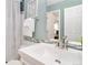 Elegant bathroom with a vanity sink, and decorative tile accents at 2645 S Xanadu Way # D, Aurora, CO 80014