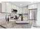 Kitchen with stainless steel appliances and a stone countertop at 2645 S Xanadu Way # D, Aurora, CO 80014
