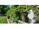 Lush garden with a variety of plants and a rustic fence, creating a serene outdoor space at 7600 Kline Dr, Arvada, CO 80005