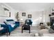Stylish living room with a contemporary design, featuring chic furniture, modern decor, and hardwood floors at 7600 Kline Dr, Arvada, CO 80005