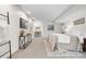 Bright main bedroom features a comfortable bed, modern furniture, and stylish decor at 7600 Kline Dr, Arvada, CO 80005