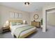 Cozy bedroom featuring a comfortable bed, stylish nightstands, and tasteful decor for a relaxing ambiance at 15650 E Eldorado Dr, Aurora, CO 80013