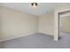 Spacious bedroom with neutral carpeting, providing a blank canvas to create your personal retreat at 15650 E Eldorado Dr, Aurora, CO 80013