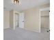 Serene bedroom with soft carpeting and convenient access to a walk-in closet, perfect for creating a personalized sanctuary at 15650 E Eldorado Dr, Aurora, CO 80013