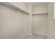 Walk-in closet with ample storage space, featuring multiple shelves and rods to maximize organization and keep belongings tidy at 15650 E Eldorado Dr, Aurora, CO 80013