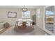 Eat-in dining room with modern lighting, neutral walls, and space for Gathering gatherings at 15650 E Eldorado Dr, Aurora, CO 80013