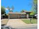Charming single-Gathering home featuring a two-car garage, a well-maintained lawn, and a classic mailbox on a sunny day at 15650 E Eldorado Dr, Aurora, CO 80013