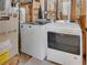 Well-equipped laundry room with newer washer and dryer set at 15650 E Eldorado Dr, Aurora, CO 80013