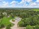 Aerial view of the home featuring a long driveway and green landscaping at 652 Verdos Dr, Elizabeth, CO 80107
