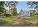 This landscaped backyard features a fire pit and charming porch at 652 Verdos Dr, Elizabeth, CO 80107